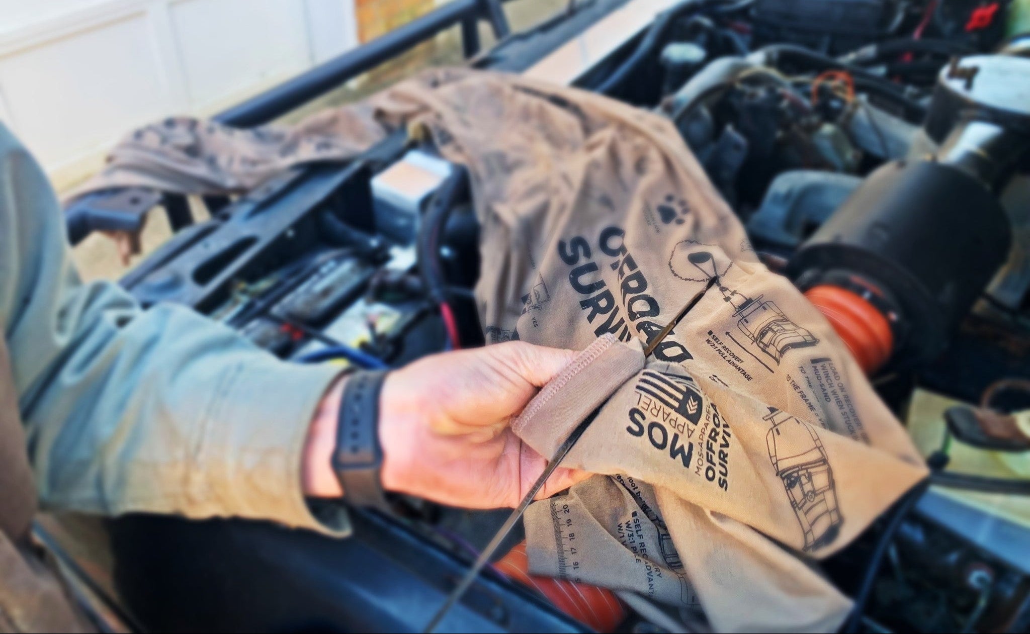 MOS Apparel offroad survival scarf used during vehicle maintenance, veteran-owned military gear